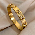 Bracelet fleurs acier inoxydable